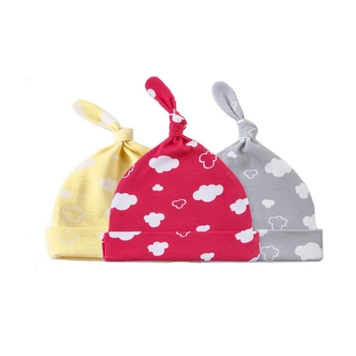 le bébé 100% nouveau-né d'hiver du coton 180G couvre les chapeaux tricotés par bébé rose écologiques